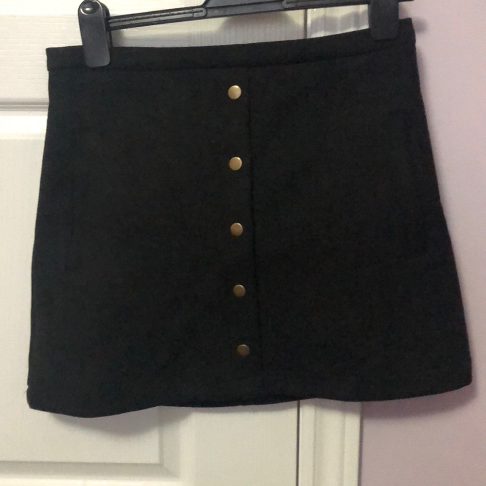 Black skirt with gold buttons